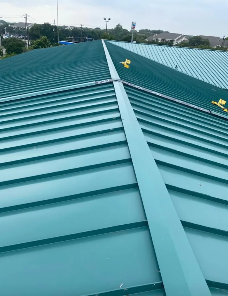 Green commercial metal roof ridge and valley for Metal Roof Repair in Hays