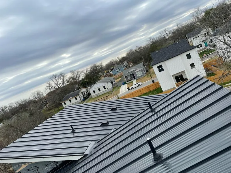 Standing seam metal roof panels with vents for Skylight Repair in Hays